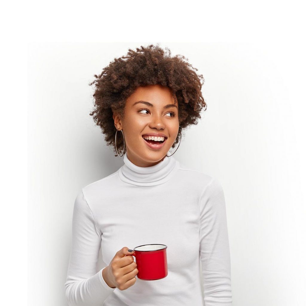 Quality Vending - Vending Services, Vending Machines, Micro Markets, Office Coffee, Pantry Services. A young woman enjoys a delicious cup of coffee from our Office Coffee Service